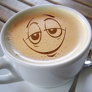 tasse de café avec sourire