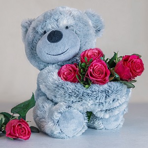 ours en peluche avec des roses